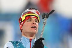 Michal Krčmář v závodě biatlonistů s hromadným startem na ZOH 2018