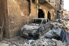 Rozbombardované město Dúmá.