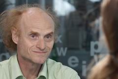 Kvůli viru hloupne 80 procent lidí, mění se psychika člověka, léčíme jen některé, říká Flegr