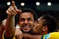 Brazil's Fred celebrates with teammate Neymar after scoring