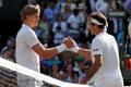 Kevin Anderson a Roger Federer po čtvrtfinále Wimbledonu 2018