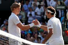 Kevin Anderson a Roger Federer po čtvrtfinále Wimbledonu 2018