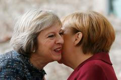 Merkelová s Mayovou