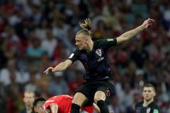 Domagoj Vida a Alexandr Golovin v zápase Rusko - Chorvatsko na MS 2018