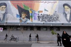 Alí Chameneí a jeho předchůdce Ruholláh Chomejní