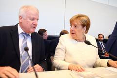 Horst Seehofer a Angela Merkelová.