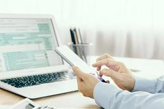 Ilustrační fotografie, daňové přiznání, přiznání k dani z příjmů, formulář, daně, 2018