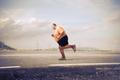 Obezita tlustý muž jogging ilustrační foto