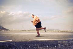 Obezita tlustý muž jogging ilustrační foto