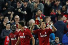 fotbal, Liga mistrů 2018/2019, Liverpool - Paris St. Germain, Roberto Firmino (vpravo) slaví vítězný gól