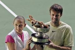 Jelena Lichovcevová a Daniel Nestor