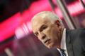 Blackhawks head coach Quenneville directs his team against t