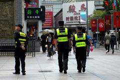 Čína, čínská policie - ilustrační foto.
