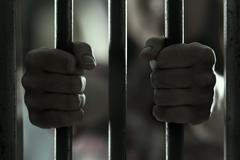 Zahraničí / Ilustrační snímek / Vězení / Mříže / Odsouzený / Výkon trestu / Ruce