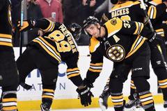 NHL: David Pastrňák a Patrice Bergeron