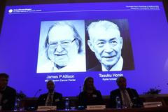 Držitelé Nobelovy ceny za lékařství James P. Allison a Tasuku Honjo.