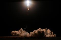 A SpaceX Falcon 9 rocket, carrying the Crew Dragon spacecraft, lifts off on an uncrewed test flight to the International Space Station from the Kennedy Space Center in Cape Canaveral