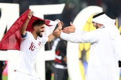 Fotbalisté Kataru slaví vítězství na Mistrovství Asie v roce 2019