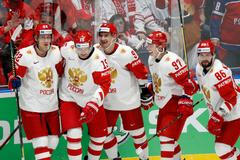 Arťom Anisimov se spoluhráči slaví gól v síti Švýcarska na MS 2019