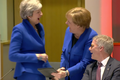 Merkelová se s Mayovou před odložením brexitu nasmály. Důvodem měly být jejich kostýmy