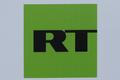 FILE PHOTO: The logo of Russian television network RT is seen on a board at the SPIEF 2017 in St. Petersburg