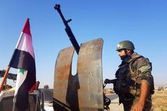 Voják syrské armády na severovýchodě země, kam si Kurdové vyžádali pomoc od režimu Bašára Asada.