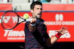 Tennis - Japan Open - Men's Singles - Quarter-Finals - Ariake Coliseum, Tokyo, Japan - October 4, 2019. Novak Djokovič of Serbia plays again
