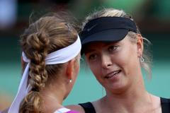 Petra Kvitová a Maria Šarapovová po semifinále French Open 2012