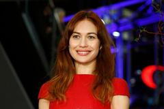 Actress Kurylenko arrives for screening during opening gala of 65th Berlinale International Film Festival in Berlin