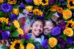 Flowers and photos of Kobe Bryant and his daughter Gianna "Gigi"