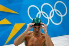FILE PHOTO: South African swimmer Roland Schoeman attends a training session at the Aquatics Centre before the start of the London 2012 Olympic Games in London