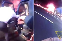 Policista z New Jersey natočil záchranu řidiče z hořícího kamionu