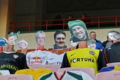 Mannequins dressed in football jerseys with cut-out portraits of fans from different countries are seen in the stands during the match between FC Dynamo Brest and FC Shakhtyor Soligorsk in Brest