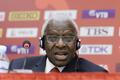 FILE PHOTO: President of International Association of Athletics Federations (IAAF) Diack answers a question at a news conference in Beijing,