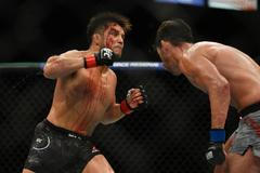 MMA, UFC, Henry Cejudo (red gloves) fights Dominick Cruz