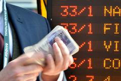 Sázení na dostihy - ilustrační foto