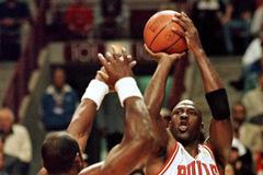 FILE PHOTO: Chicago Bulls' Michael Jordan shoots over Utah JazzÕs Karl Malone during the first period of the second game of the NBA Finals at the United Center, Chicago.