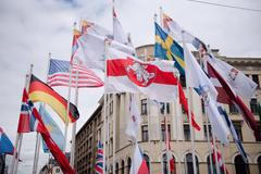 Stržení oficiální vlajky Běloruska vyvolalo roztržku mezi rižským starostou a IIHF