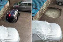 Zaparkovaný automobil najednou zmizel v díře v zemi. Jeho majitel mohl jen bezmocně přihlížet