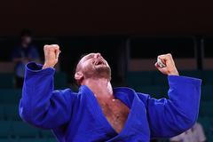 Lukáš Krpálek slaví triumf v semifinále OH 2020.s Japoncem Hisajošim Harasawou