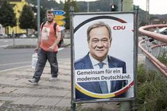 Foto: Kde je Laschet? Volební favorit končící Merkelové čelí kritice kolegů i voličů