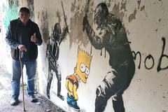 Darrell Meekcom a graffiti s Bartem Simpsonem