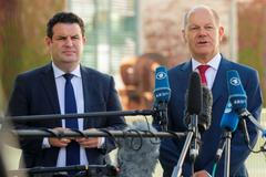 Německý ministr práce Hubertus Heil a kancléř Olaf Scholz