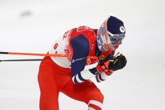 Tomáš Portyk v běžecké části týmového závodu