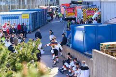 hokej, MS 2022, hráči Německa čekají před halou po požárním poplachu