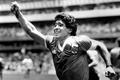 FILE PHOTO: Argentinian star Diego Maradona raises his arm in the air after scoring