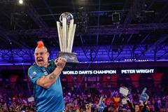 Peter Wright oslavuje triumf na MS v šipkách 2022