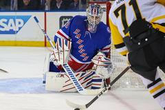 New York Rangers goaltender Igor Shesterkin (31) defends the net as Pittsburgh Penguins center Evgeni Malkin