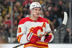 Matthew Tkachuk v dresu Calgary