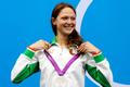 FILE PHOTO: Belarus' Aliaksandra Herasimenia smiles with her silver medal during the women's 100m freestyle victory ceremony during the London 2012 Olympic Games at the Aquatics Centre